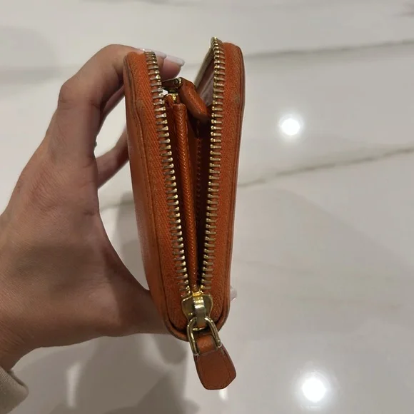 Prada Orange zipper wallet